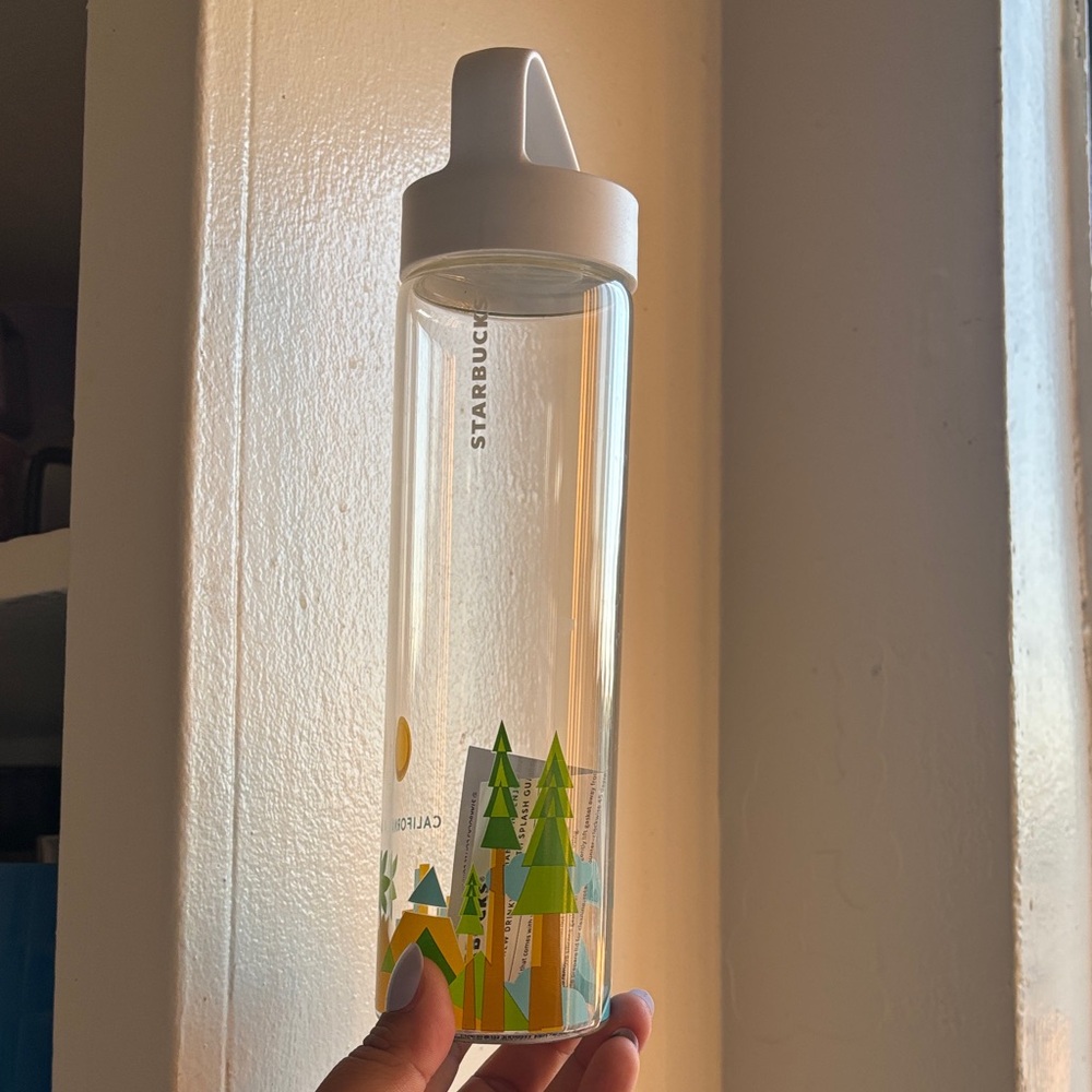 Starbucks Clear Bottle with Green and Yellow Tree Design